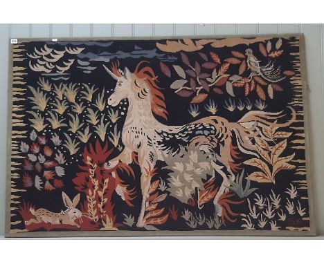 A large tapestry of a unicorn surrounded by flora, fauna and woodland creatures, (20th Century), monogrammed 'S.K' lower righ