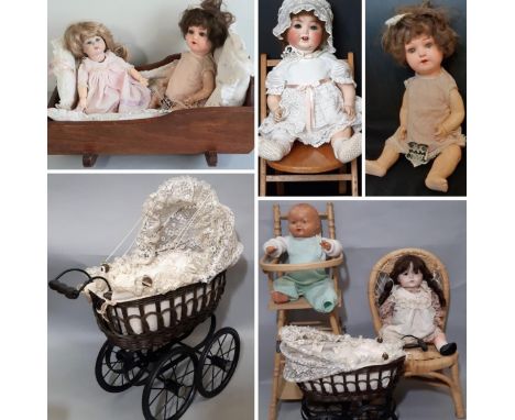 Collection of antique and reproduction dolls and accessories including a large bisque head character doll by Ernst Heubach, e