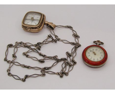 Yellow metal compass / seal swivel fob hung on a fancy link white metal chain necklace, together with a red guilloche enamell