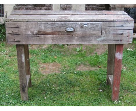 Two vintage pine work benches of varying size, one incorporating a frieze drawer, the larger example 152 cm (5ft) long x 62 c