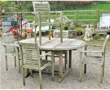 Weathered teak D-end extending garden table with slatted panelled top and two bi-folding leaves, raised on square cut support