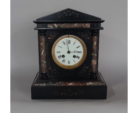 A Victorian black slate and polished marble mantle clock of architectural form enclosing and eight day striking movement (key