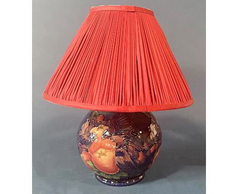 A Moorcroft pomegranate and finch pattern table lamp and shade (to be re-wired) with original receipt year 2000 £360 