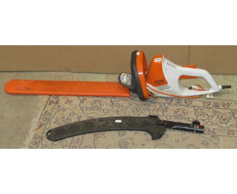 A Stihl electric hedge trimmer model HSE42 together with a Castelgarden XC 19 PE electric chainsaw and a Silkie Hayauchi exte
