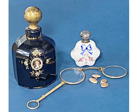 A glass toilet water bottle with applied gilded detail, a further small 19th century ceramic scent bottle with silver lid, pa