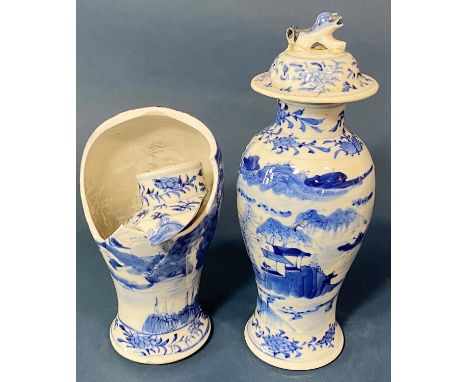 Two Chinese blue and white porcelain baluster vases (Qing period), both with four-character Kangxi mark underneath, one broke