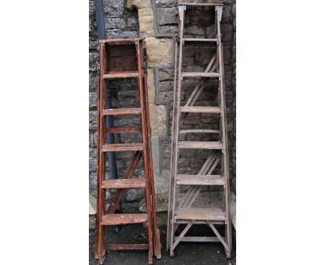 A vintage Stones patent pine folding step ladder together with one other, (to be sold for display purposes only) 