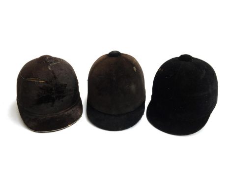 Three vintage black hunting caps, two retailed by Caldine, size 7 1/8 and 7 1/4, one by Moss Bros 