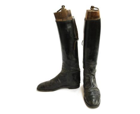 A pair of lady's black leather hunting boots with trees, approximately size 6 