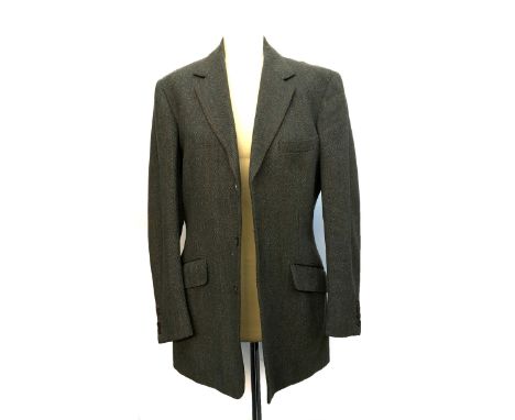 A gent's tweed suit, in herringbone tweed, made by Ward &amp; Kruger, Sackville Street London W1, 1979, the jacket single bre