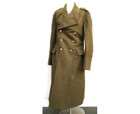 An army greatcoat, 1951 pattern size 10, with Royal Army Service Corps buttons and two pips to each shoulder bearing the mott