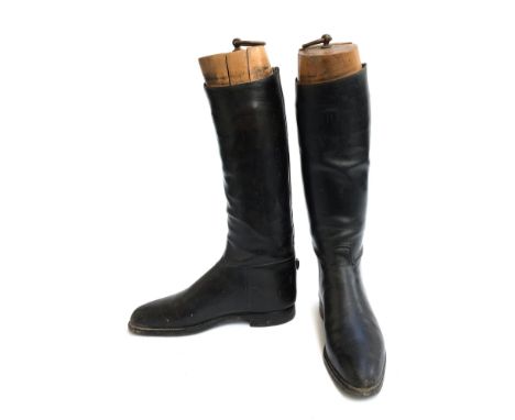 A pair of gent's hunting boots with fitted wooden trees, approximately size 9, narrow fit 