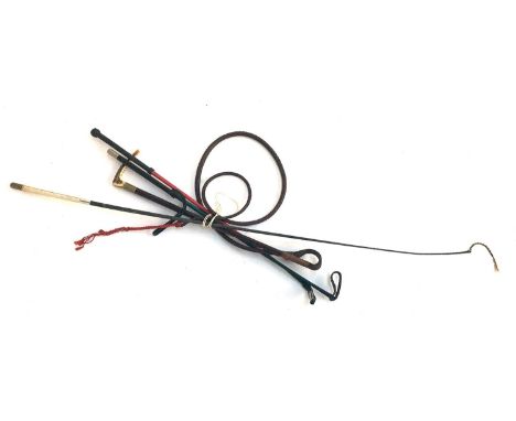 A child's hunting whip, 50cm long, with leather thong; together with three riding whips 