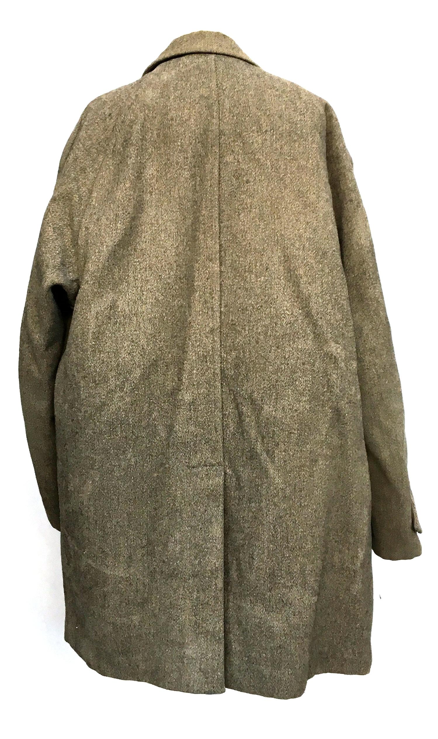 J.C. Cording & Co Ltd Piccadilly, a heavy keeper's tweed shooting coat ...