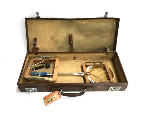 A gent's vintage leather squash holdall, 73cmW, with Hanimex squash racket, with two vintage Dunlop wooden racket presses, an