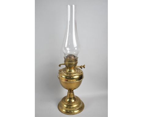 A Brass Oil Lamp with Plain Glass Chimney 