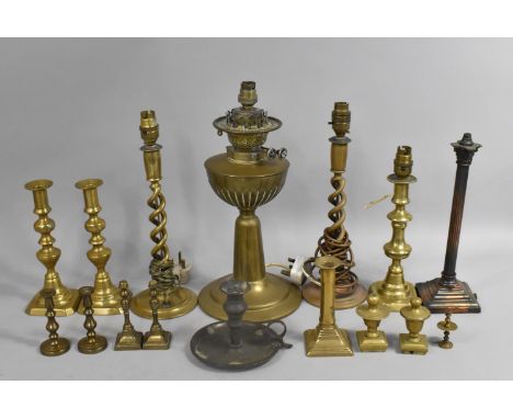 A Collection of Various Brass Candlesticks, Some Converted to Electricity, Brass Finials of Vase Form, Corinthian Column Tabl