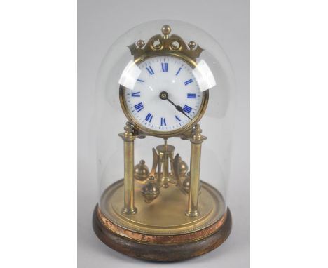 A German Brass Pillar Clock Under Glass Dome, 26.5cms High 