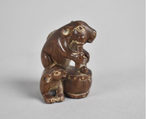 A Small Oriental Carved Netsuke in the Form of a Mouse Playing Drum, 4.5cm high 