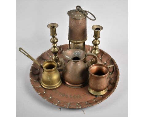 A Collection of Copper and Brass Items to Include Miners Lamp, Measuring Jug, Cider Warmer, Candlesticks etc 