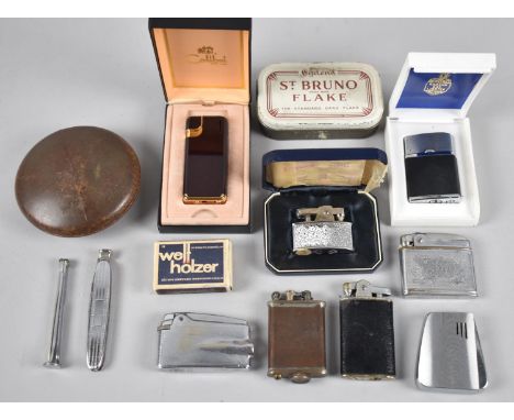 A Collection of Various Vintage Cigarette Lighters, Pipe Knife and Tamper, Circular Tobacco Box etc (Please note we are unabl