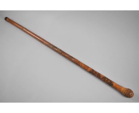 A Vintage Bamboo Walking Cane with Carved Oriental Decoration Depicting Elder on Mountain Path 