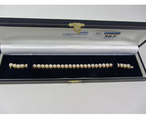 Gold pearl hinged link bracelet hallmarked 14ct Condition Report Click here for further images, condition, auction times & de