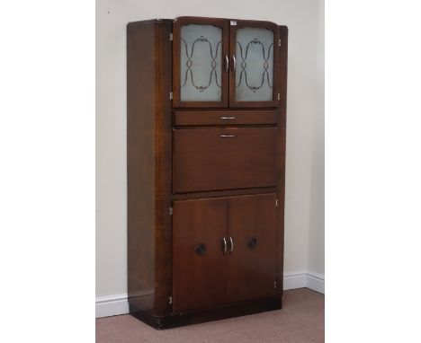 Lebus mid 20th century walnut kitchen cabinet cupboard above enclosed by two glazed doors, singe drawer and fall front work t