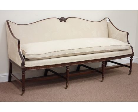 Early 20th century mahogany Regency style three seat sofa, upholstered in cream chenille fabric, fluted frieze and front legs