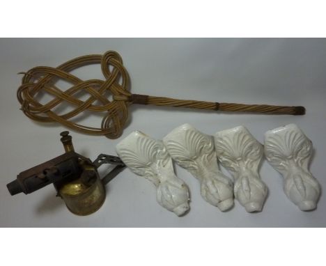 Paraffin lamp, carpet beater, and a set of cast iron claw bath feet Condition Report Click here for further images, condition