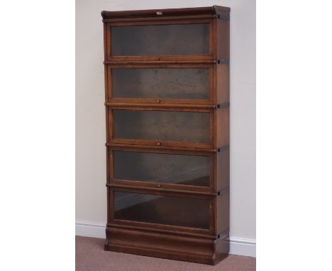 Early 20th century probably Globe Wernicke oak five sectional stacking library bookcase, enclosed by five double hinged glaze