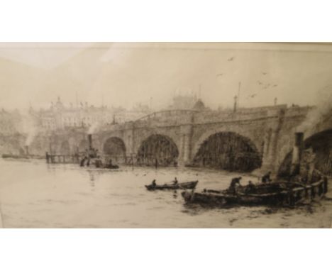 William Lionel Wyllie (1851-1831) Barges on the Thames by a bridge, etching, signed in pencil to lower left margin, mounted i