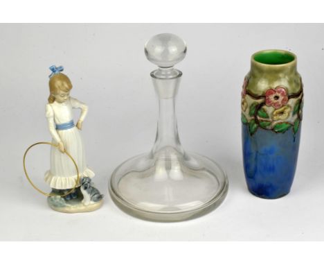 A pair of Royal Doulton vases and a single Doulton vase, Nao figurines, cut glass decanters and a ships decanter.