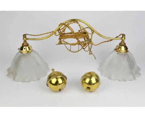 Arts and Crafts brass rise and fall chandelier, with two bell form holophane style lamp shades, together with a weight and pu