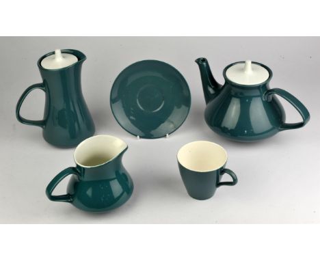 Poole pottery tea and coffee part service consisting of two coffee pots, teapot, six cups and saucers sugar and milk.