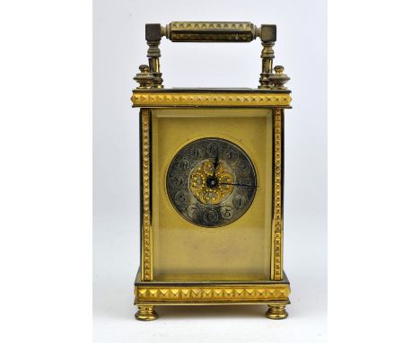 A Brass cased carriage clock, with Arabic numeral chapter ring, key to back of case, 