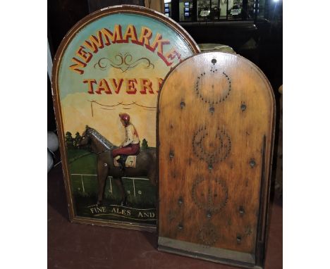A reproduction Newmarket tavern sign together with a bagatelle board.