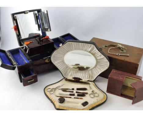 A 1920s rectangular hardwood box, a Chinese lacquer jewellery box, faux tortoiseshell manicure set and a travelling clock cas