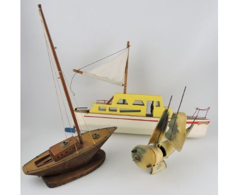 A mid 20th century scratch built model motor vessel, with white hull and yellow superstructure, L. 50cm, together with an oak