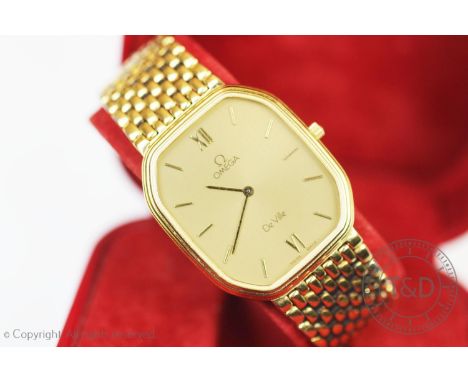 An Omega De Ville wristwatch, the octagonal gilt dial with baton markers, gold plated case 28mm wide, quartz battery movement