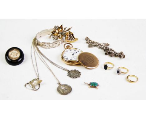 An assortment of vintage and costume jewellery, to include: a Victorian jet mourning brooch, two silver St Christopher pendan