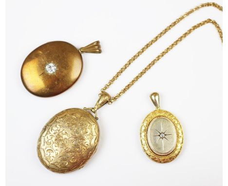 A diamond set yellow metal locket pendant, circa 1900, set with a central old cut diamond to an engraved surround, with a fur