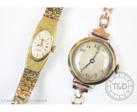 A lady's vintage 9ct yellow gold watch, Edinburgh 1933, the engine turned dial with black Arabic numerals within a plain poli