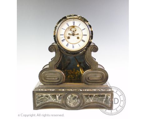 A Victorian slate and verte marble drum mantel clock, with a 16cm white enamel dial and a two train movement, 50cm high (at f