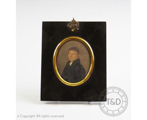 English School, 19th century, Watercolour portrait miniature of a gentleman wearing a black frock coat and white cravat,Withi