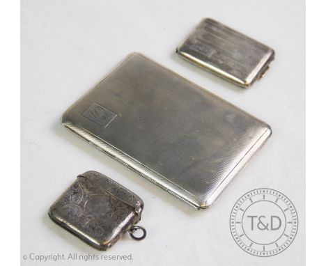 A 20th century silver cigarette case, W T Toghill &amp; Co, Birmingham 1944, with engine turned decoration to exterior, 11.5c