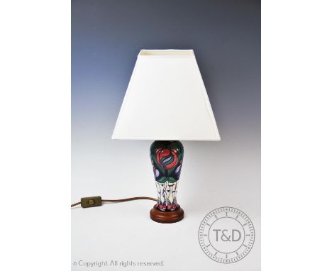 A Moorcroft table lamp of inverted baluster form, from the 'Tribute to Charles Rennie Mackintosh' range designed by Rachel Bi