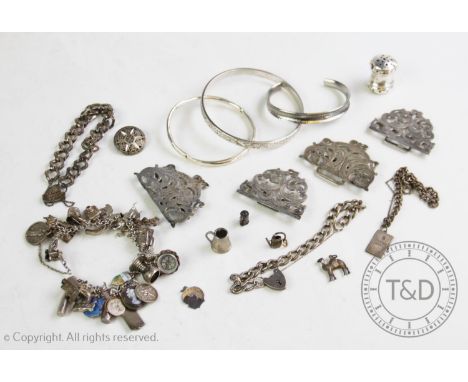 An assortment of lady?s silver and white metal accessories, to include, a silver nurses belt buckle and a further EPNS exampl