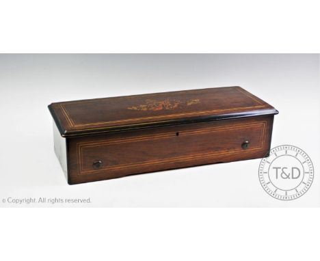 A late 19th century eight aires rosewood music box by B A Bremond, Geneva, the rectangular hinged lid centred with inlaid ins