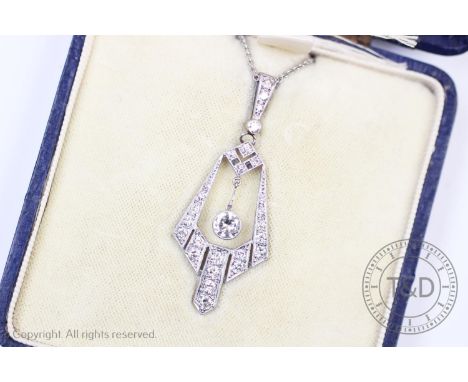 An Art Deco diamond set pendant, the tapered angular, openwork pendant set with graduated eight-cut diamonds, claw set to whi